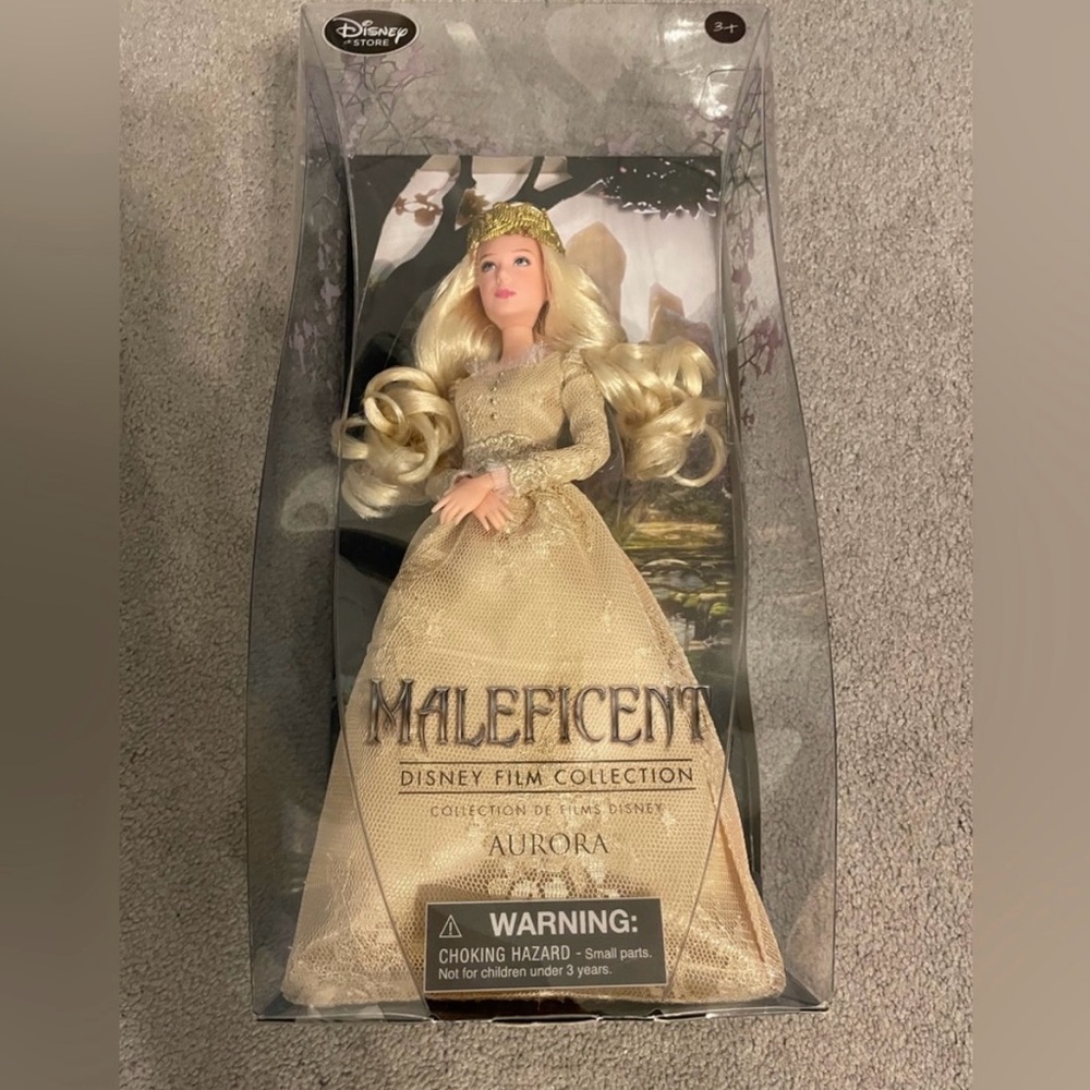 Live action Aurora and Maleficent dolls from the Disney store.